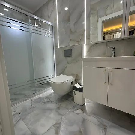 Villa Assos Suits 1